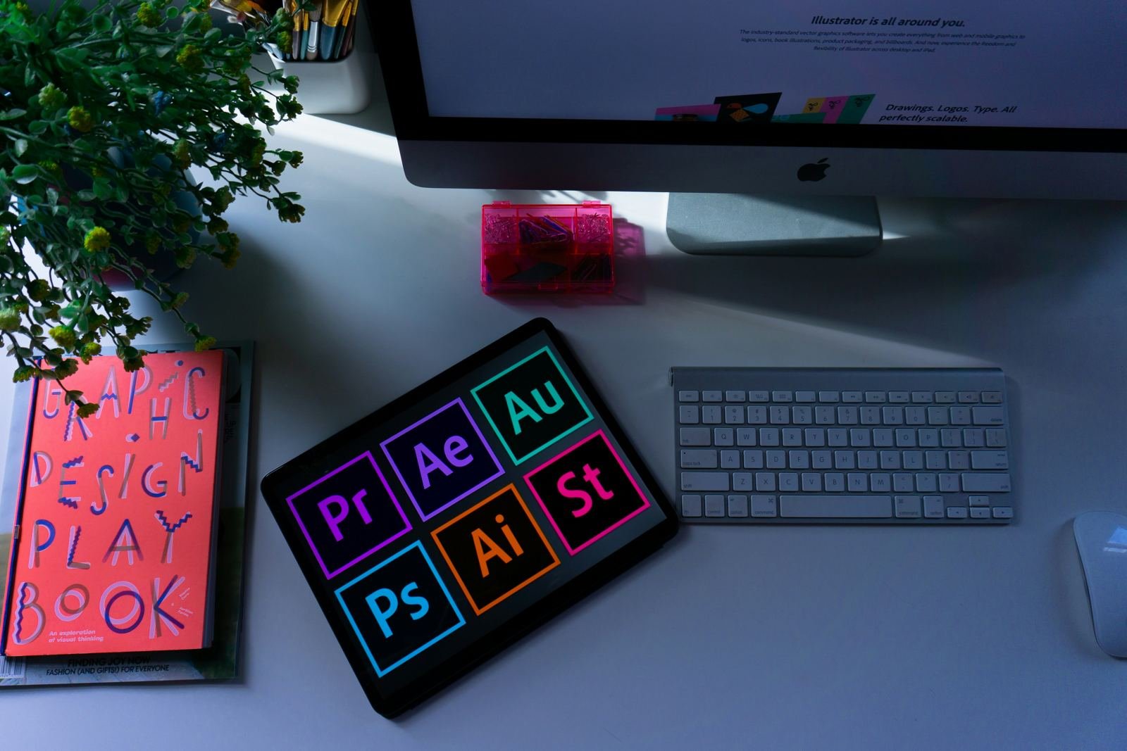 Creative software and graphic design book on a desk
